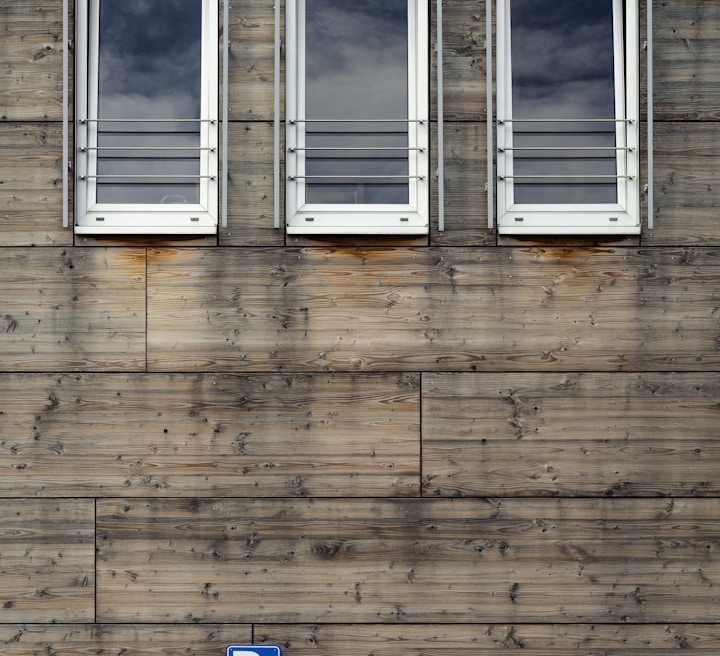 white wooden framed glass window